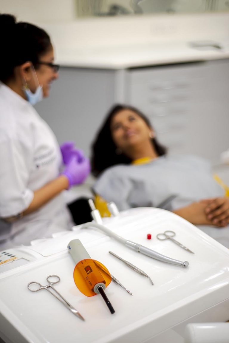Best Dentist in Gurgaon with her Patient | Alveo Dental Clinic